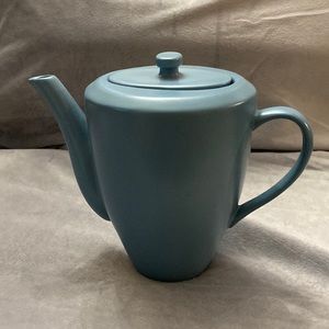 This is a sky-blue ORBIT teapot made in China.